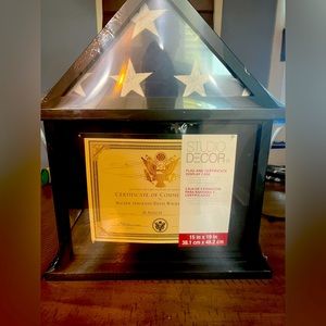 Shadow box for flag and certificate.